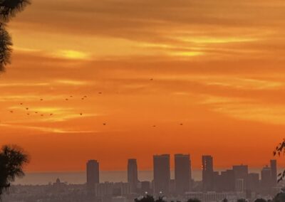 Sunset over city skyline from hillside at luxury drug rehab Los Angeles